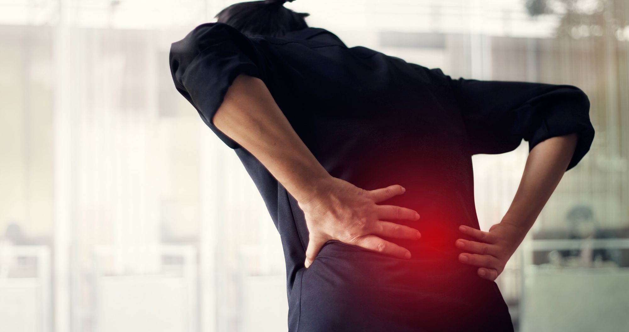 A Person Suffering From Lower Back Pain